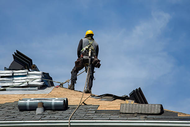 Professional Roof Repair technician working in Tillson, NY